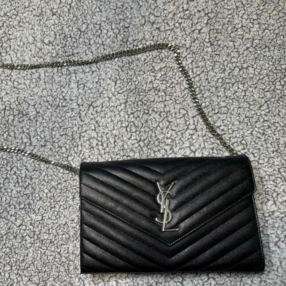 YSL wallet on a chain.